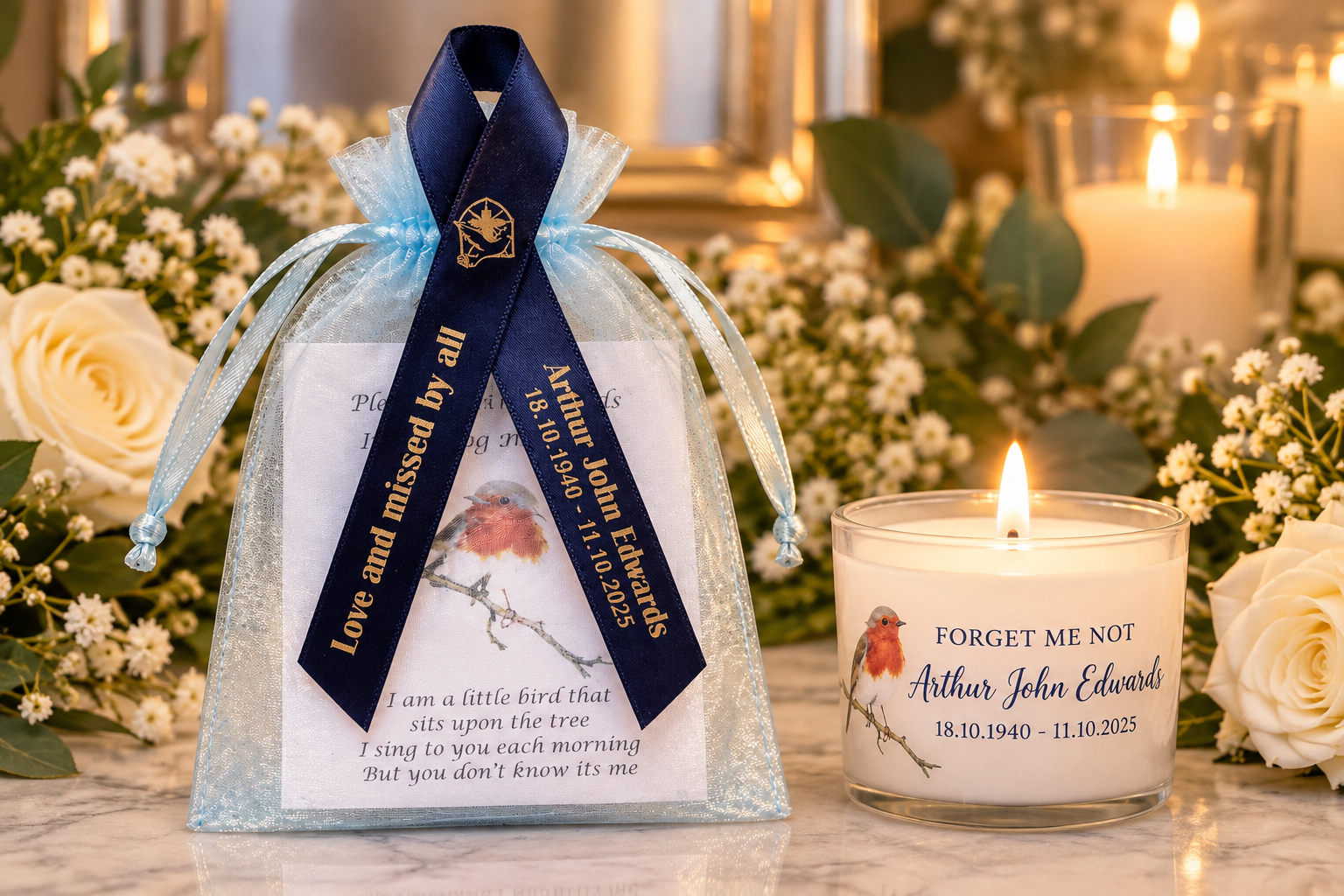 Blue ribbon memorial keepsake bag with bird poem, surrounded by flowers and a lit candle.